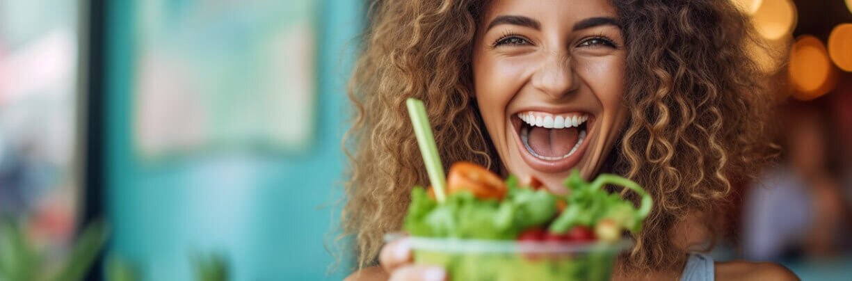 Female Gen Z vegan enjoying a salad