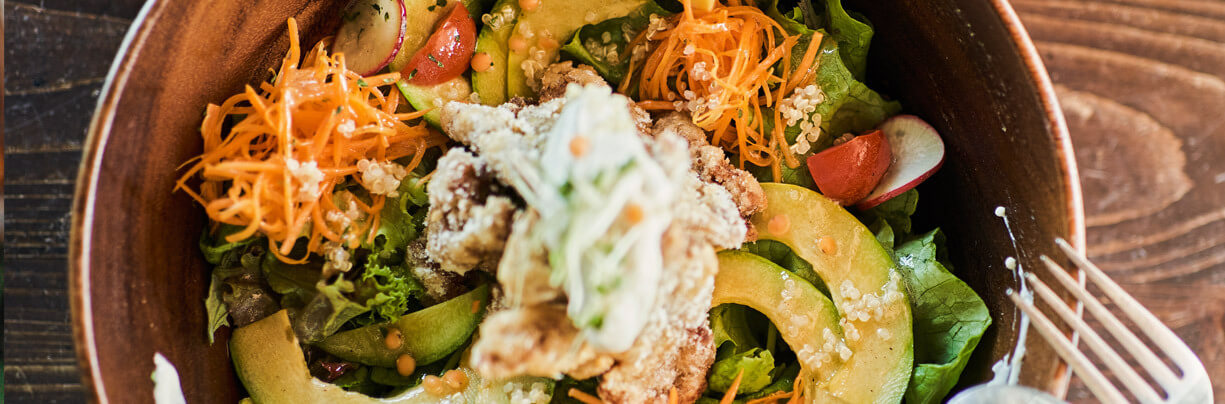 Bowl entree filled with veggies and other plant-based ingredients.