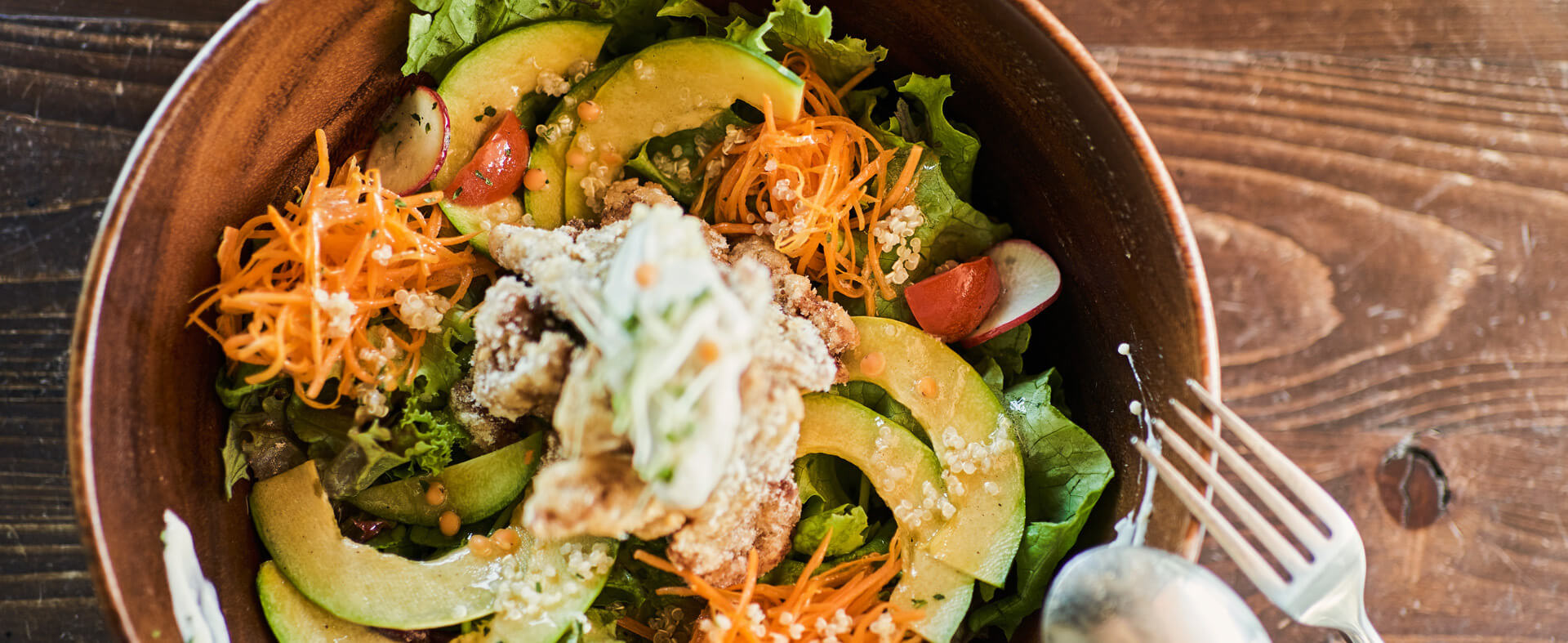 Bowl entree filled with veggies and other plant-based ingredients.
