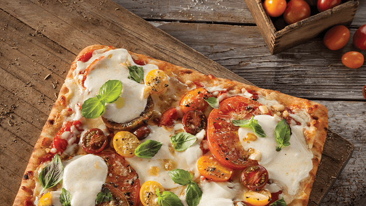 Stonefire flatbread pizza on wood background.