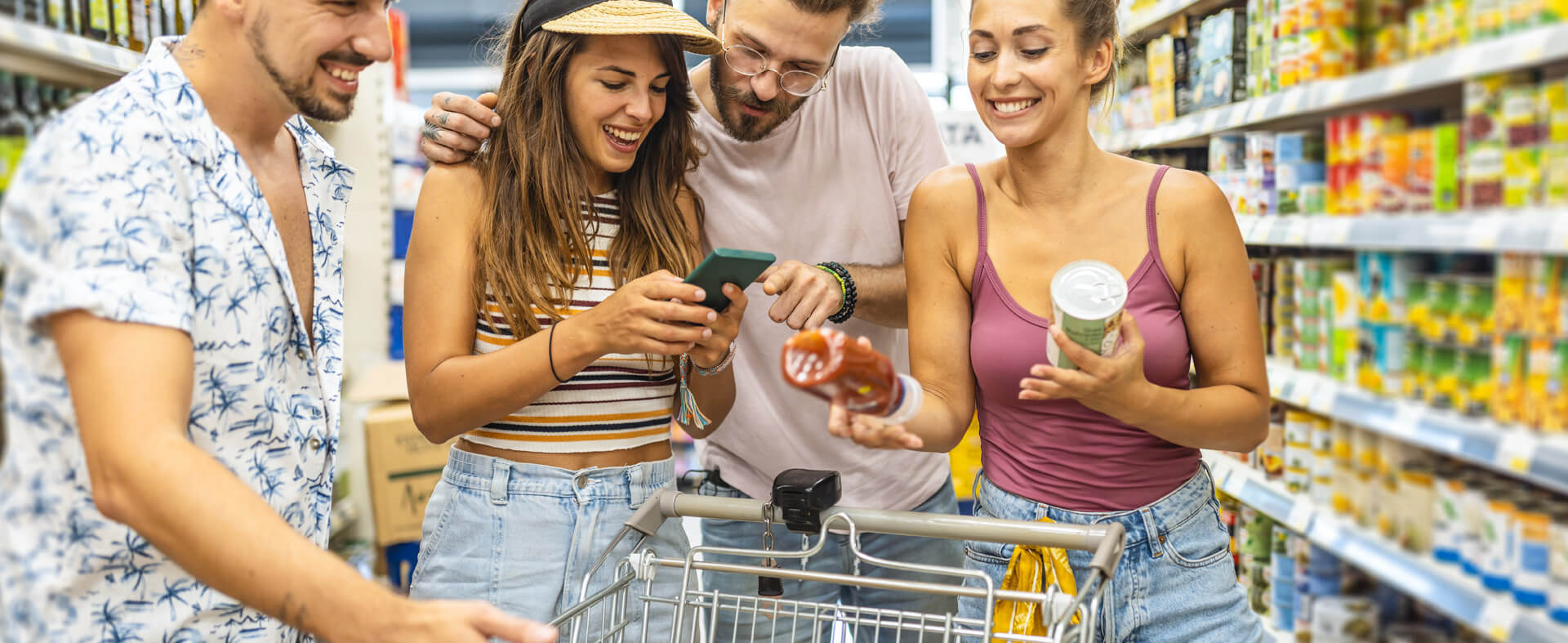 Gen Z consumers using a digital tech to search products while getting groceries.