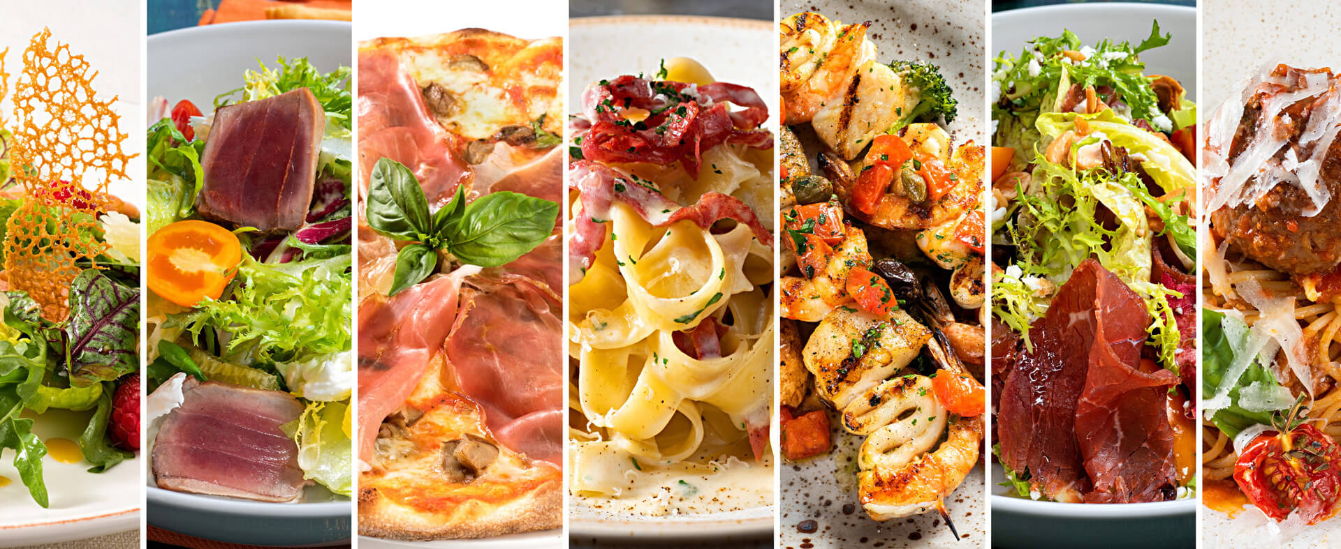 Close-up grouping of seven different food items in a row from salads and pizza to pasta and shrimp.