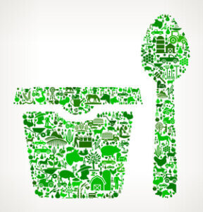 An image of a green container and a spoon with smaller images of farms, animals, and crop illustrations inside each.