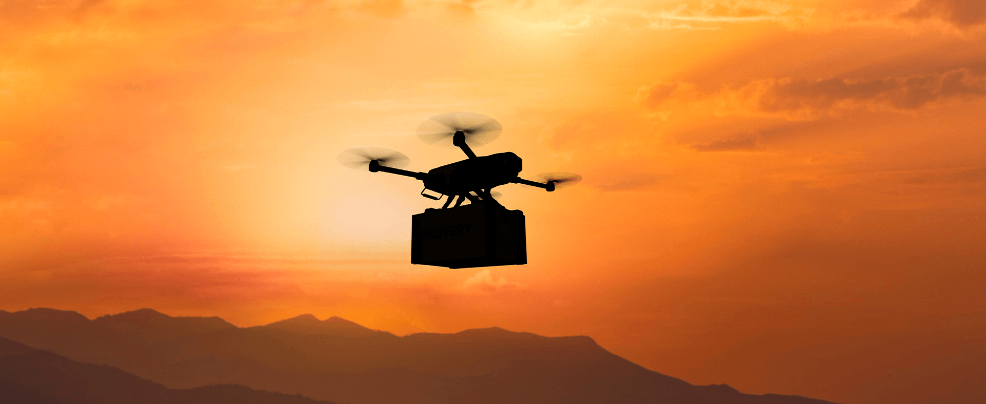 Drone delivering food at dusk