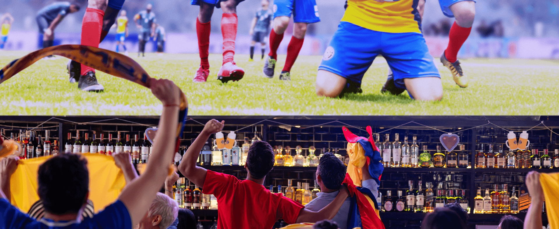 World Cup fans at a bar are watching the soccer game on a big screen.